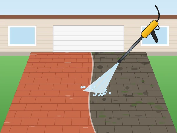 Illustration of a block-paved driveway being pressure washed in Horsham